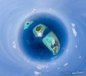 Between Munandhoo and Mahaddhoo. Planet