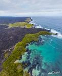 Above the southern coast of Isabela Island