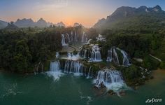 Setting sun above Detian Falls